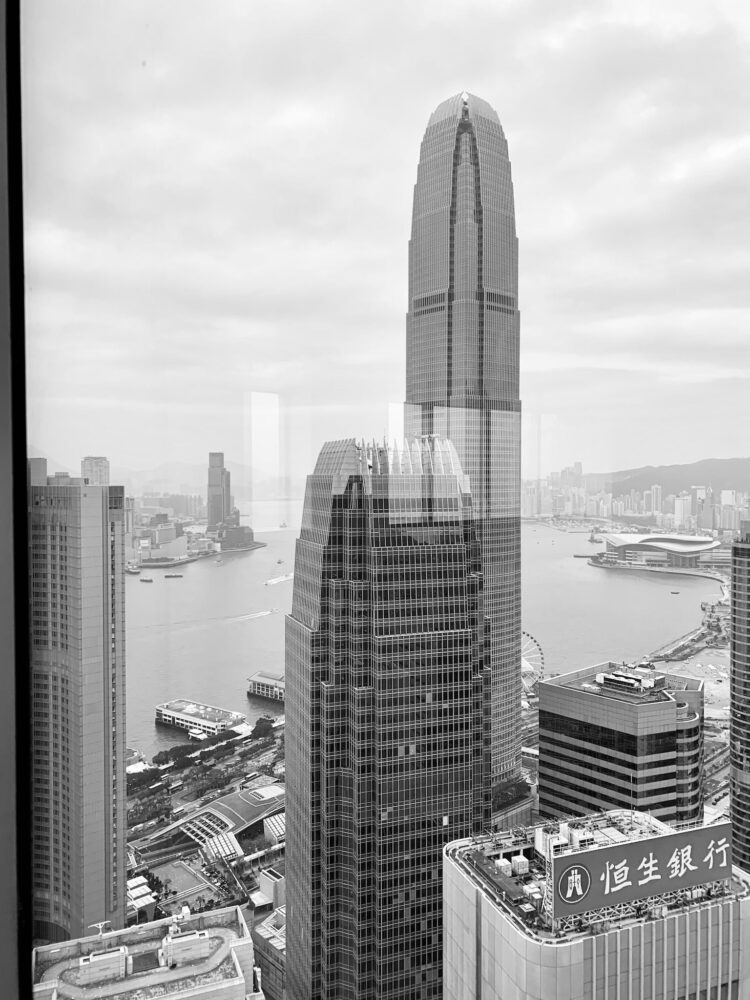 Concrete Buildings In Greyscale Photography